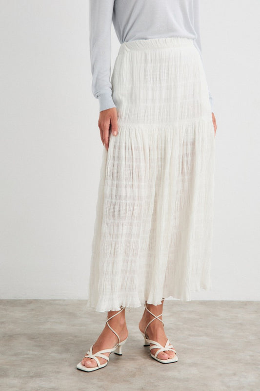 Falda cruda doble volante.